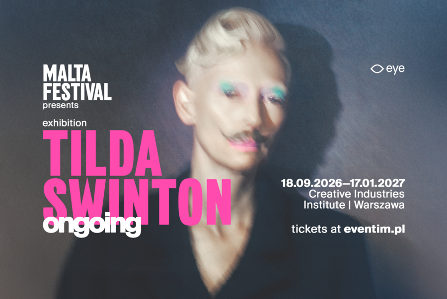 A poster for an artistic event featuring a portrait of Tilda Swinton with blond hair, striking colorful eye makeup, and a stylized mustache. On the left side, a large, pink inscription reading "TILDA SWINTON" is obscured by the white word "ongoing" and the "MALTA FESTIVAL presents exhibition" logo. On the right side, event details appear: date: September 18, 2026–January 17, 2027, venue: "Institute of Creative Industries | Warsaw," and information about ticket sales on eventim.pl.